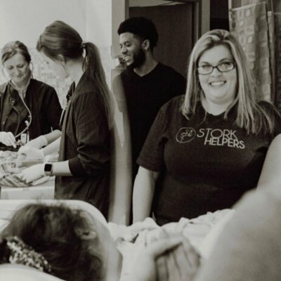 black and white photo of Tamara with family